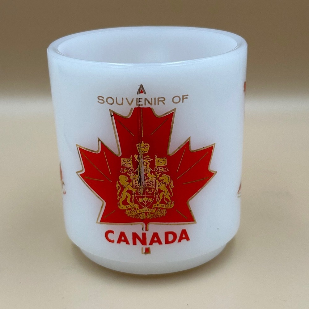Vintage Souvenir of Canada Milk Glass Coffee Mug Maple Leaf Hockey Moose Totem